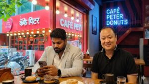 Cafe Peter Franchise Cheating Case: Accused Peter Jung and Kamlesh Kale Absconding, Sessions Court Rejects Bail Plea (AI Generated Image )
